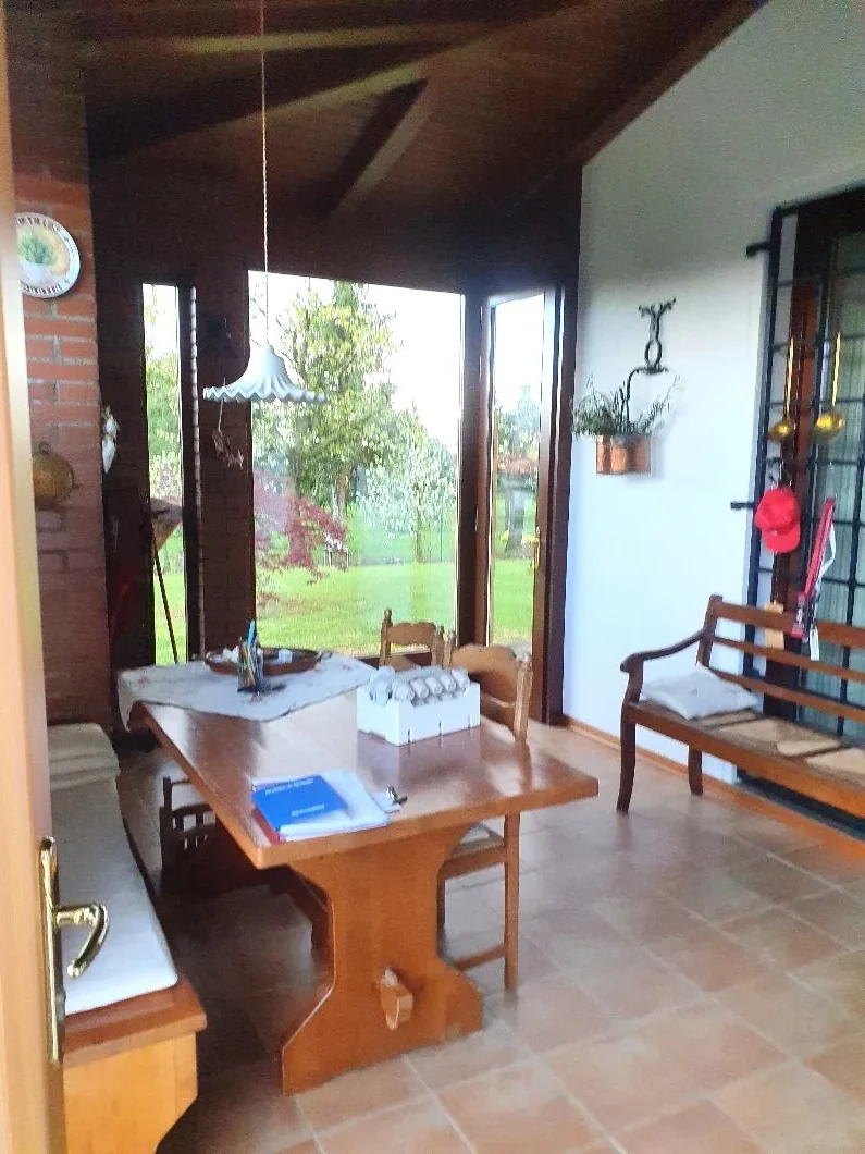 Veranda Panoramica con Vista Giardino